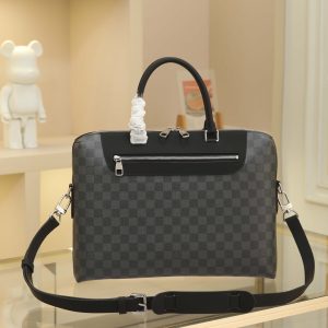 PORTE-DOCUMENTS JOUR NM Briefcase Crafted from the instantly recognizable Damier Cobalt canvas, the Porte-Documents Jour Briefcase offers a more casual and compact alternative to the Porte-Documents Voyage Travel Bag. Designed for the urban professional, this versatile bag features multiple carrying options.The front pocket features a zippered closure and accommodates a 15-inch laptop. Dimensions: 37 x 28 x 6 cm